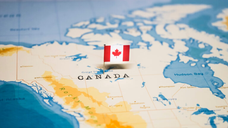 Canada pin with map and flag