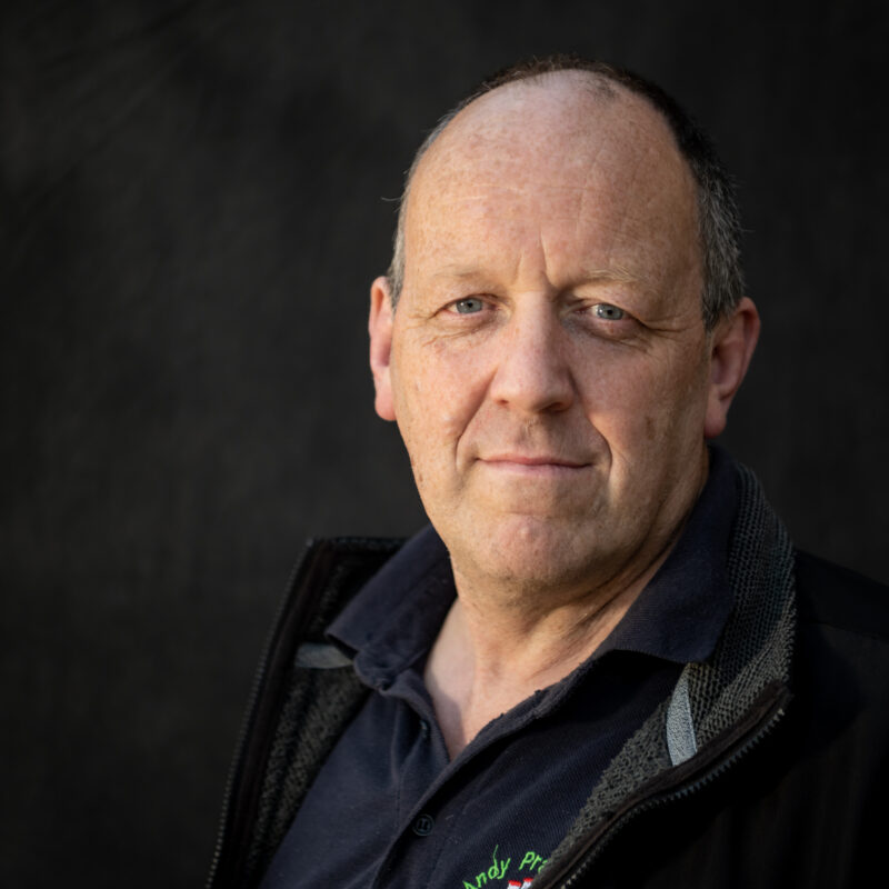 Man standing in front of a black background